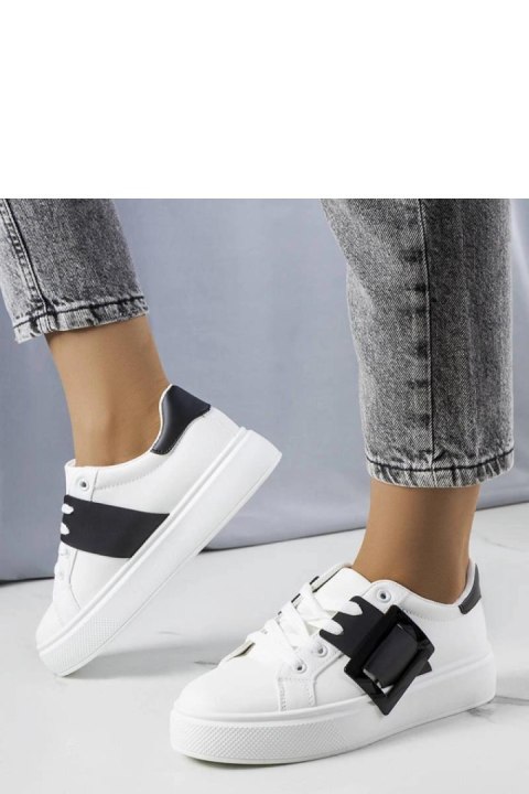 Białe sneakersy zdobione czarną klamerką Toni - Solea Białe sneakersy zdobione czarną klamerką Toni - Solea