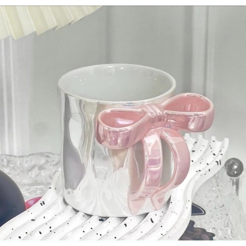 Kubek ceramiczny biały perłowy z różową kokardą 350ml 1szt CUP23 Kubek ceramiczny biały perłowy z różową kokardą 350ml 1szt CUP23